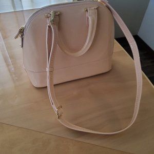 Cream colored vinyl purse